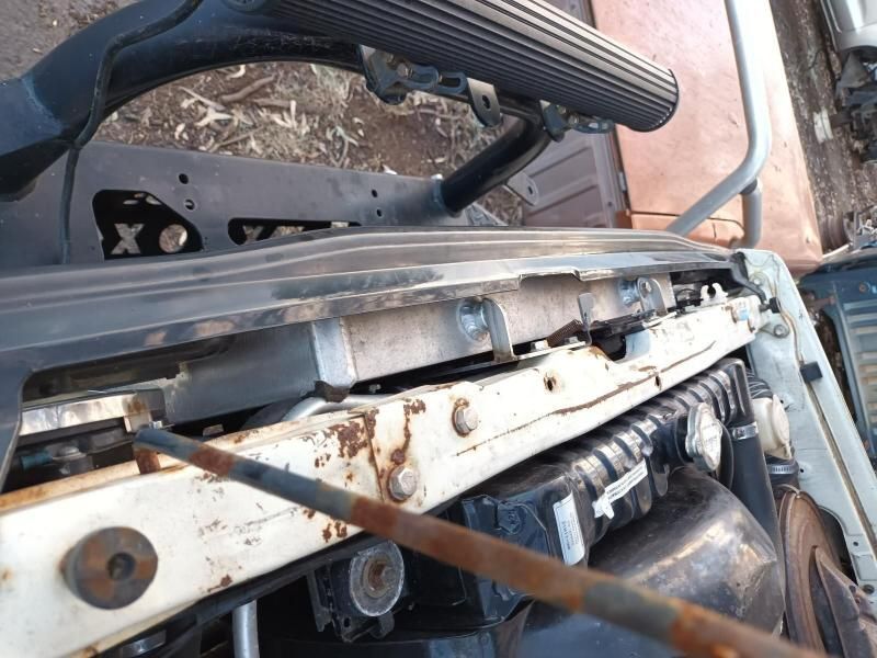 A Close Up of a Car Hood With a Steering Wheel in the Background — South West 4WD Wreckers In Brisbane, QLD