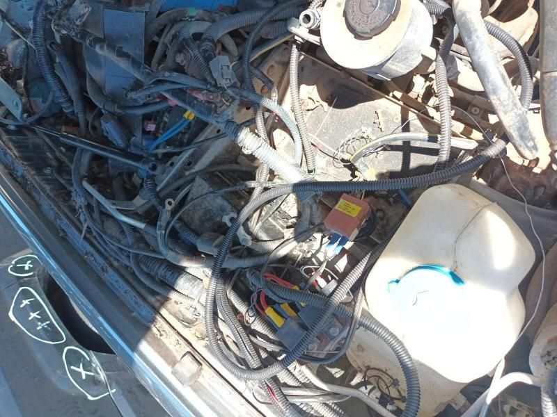 The Hood of a Car With a Lot of Wires Coming Out of It — South West 4WD Wreckers In Harristown, QLD