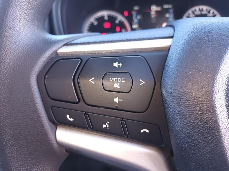 A Close Up of a Car Steering Wheel With a Mude Button — South West 4WD Wreckers In Harristown, QLD