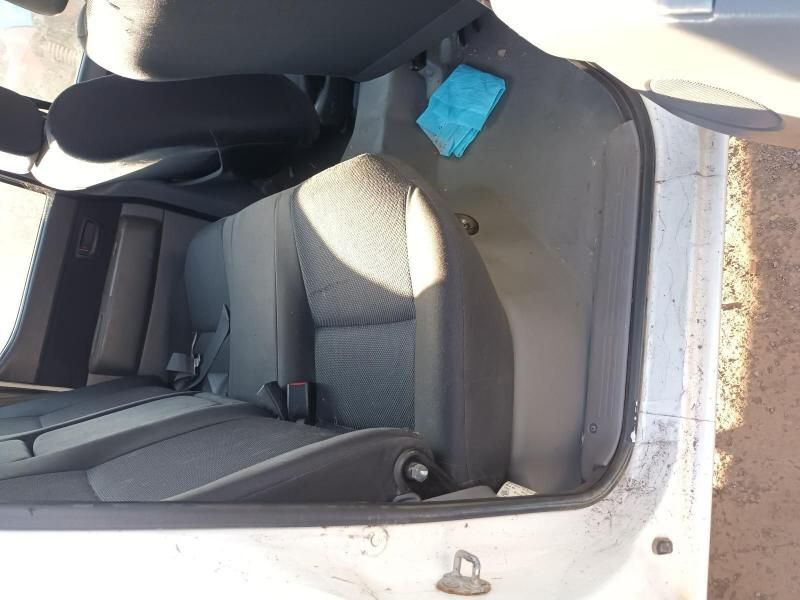 The Back Seat of a White Car With the Door Open — South West 4WD Wreckers In Harristown, QLD