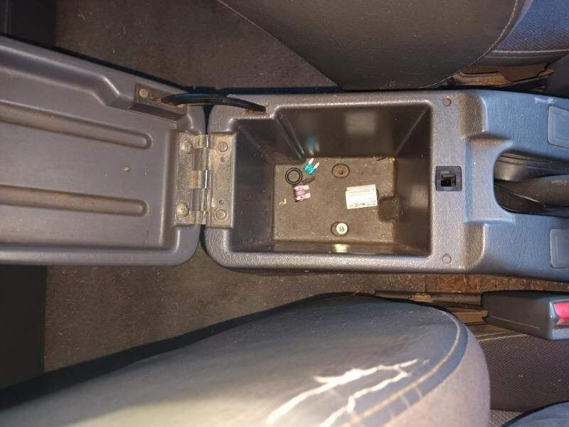 A Car Console With the Lid Open and a Small Box in It — South West 4WD Wreckers In Brisbane, QLD