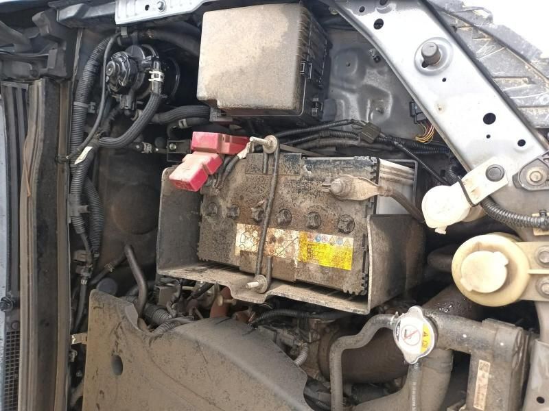 A Car With the Hood Open and a Battery in the Trunk — South West 4WD Wreckers In Brisbane, QLD