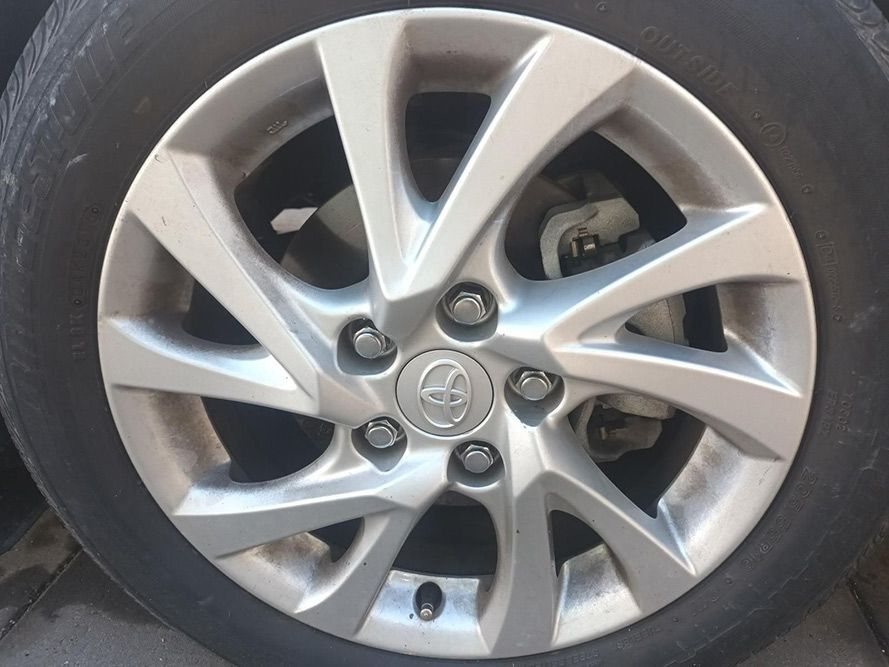 A Close Up of a Car Wheel with a Toyota Logo on It — South West 4WD Wreckers in Harristown, QLD