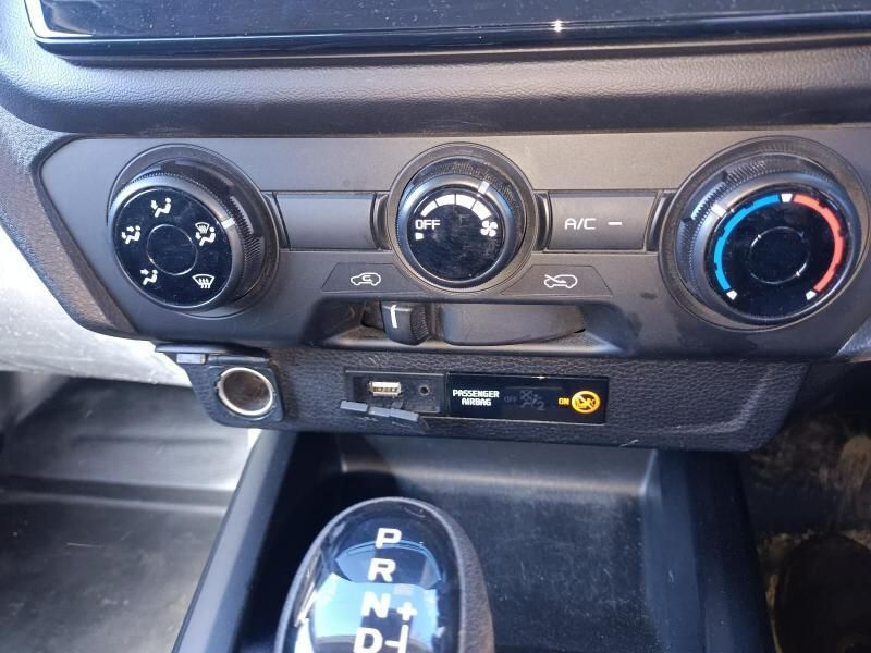 A Close Up of a Car 's Climate Control and Shifter — South West 4WD Wreckers In Harristown, QLD