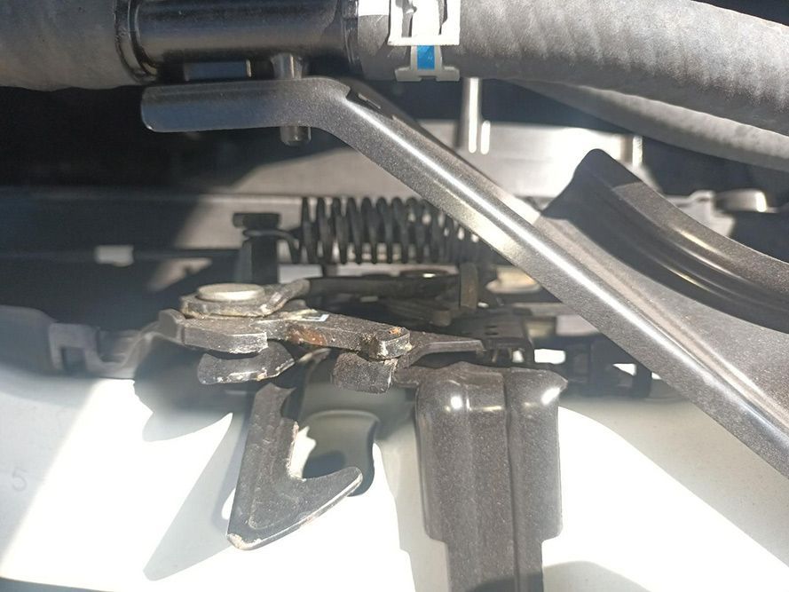 A Close Up of a Hood Latch on a Car — South West 4WD Wreckers in Harristown, QLD