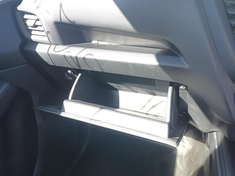 A Black Glove Box is Open in a Car — South West 4WD Wreckers In Harristown, QLD