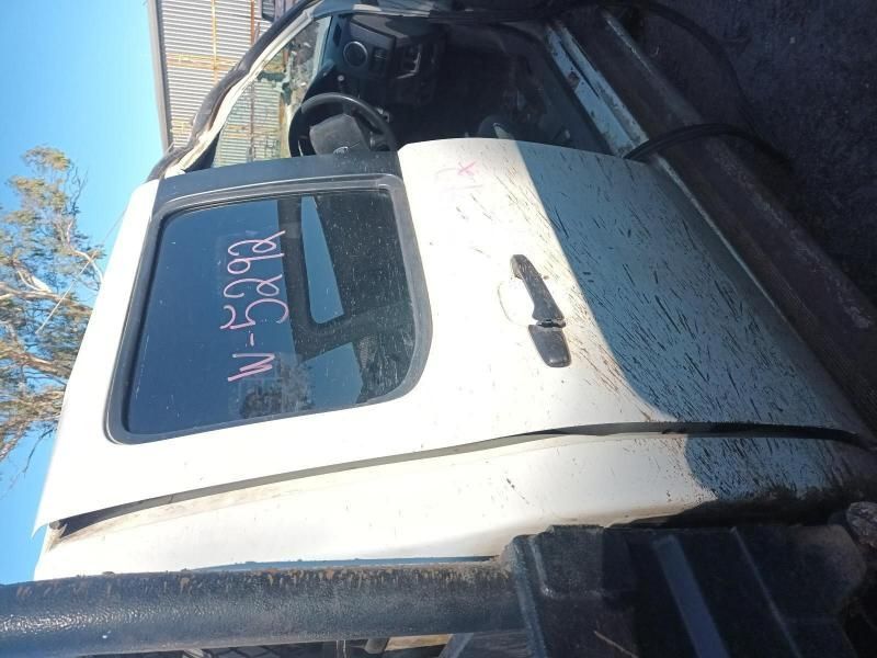 A White Truck With the Door Open and a Sticker on the Window — South West 4WD Wreckers In Harristown, QLD