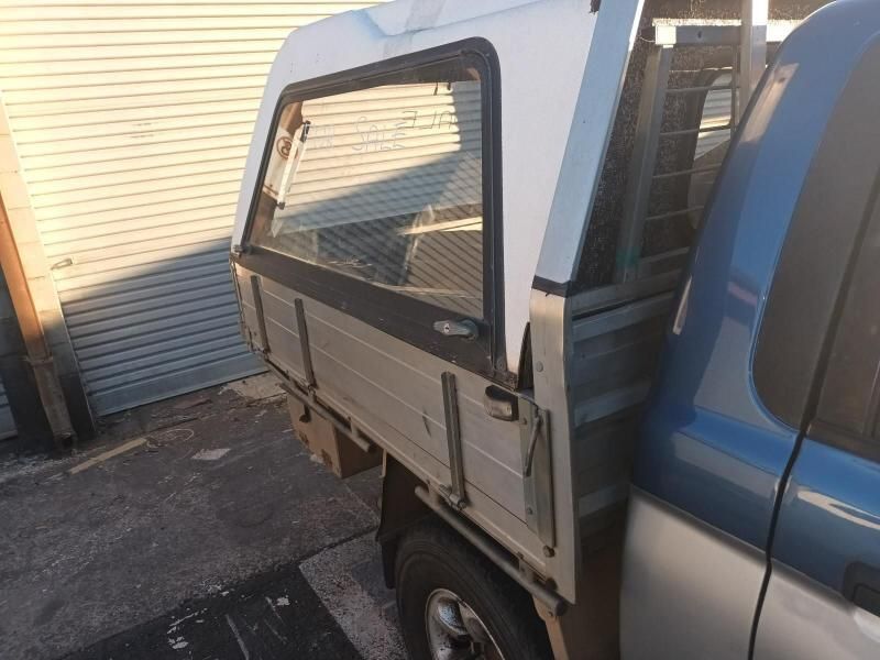 A Blue and White Truck With a Canopy on Top of It — South West 4WD Wreckers In Brisbane, QLD
