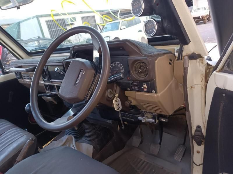 The Inside of a White Car With a Steering Wheel — South West 4WD Wreckers In Brisbane, QLD
