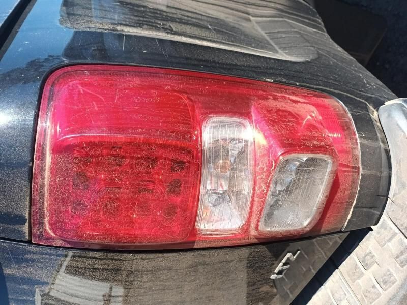 A Close Up of a Black Car 's Tail Light — South West 4WD Wreckers In Harristown, QLD