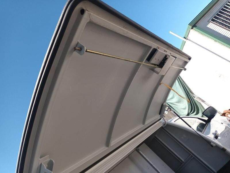 Looking Up at the Roof of a Vehicle With the Door Open — South West 4WD Wreckers In Harristown, QLD