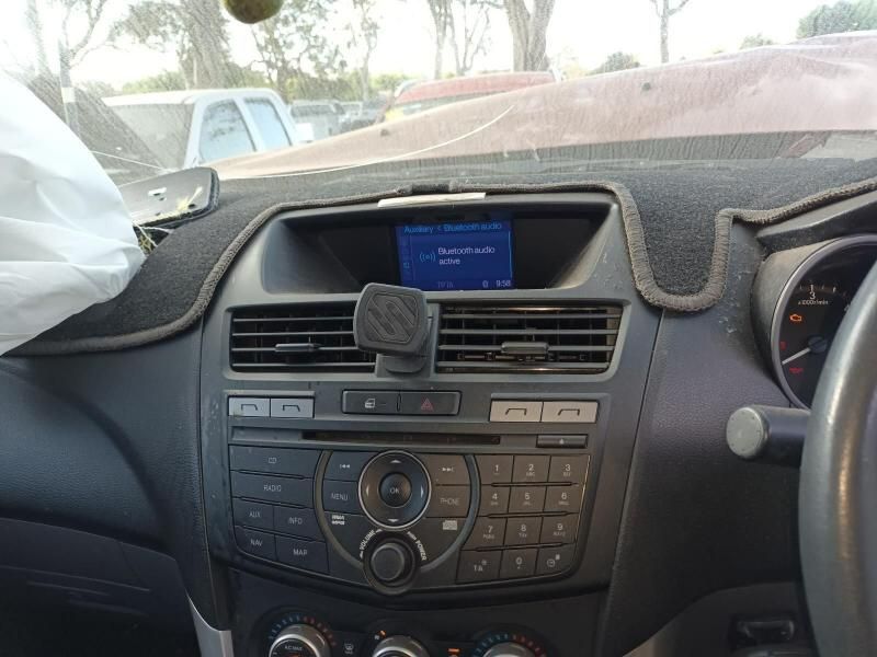 The Dashboard of a Car With a Phone Holder on It — South West 4WD Wreckers In Harristown, QLD