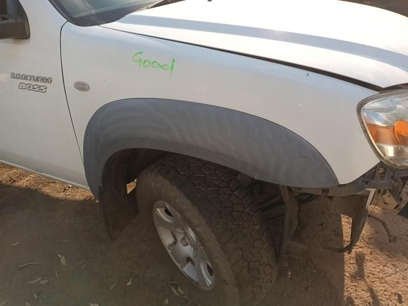 A White Truck With the Word Good Written on the Hood — South West 4WD Wreckers In Harristown, QLD