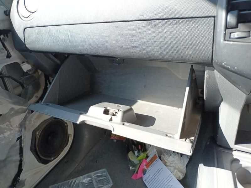 An Open Glove Box in a Car With a Speaker in the Background — South West 4WD Wreckers In Harristown, QLD
