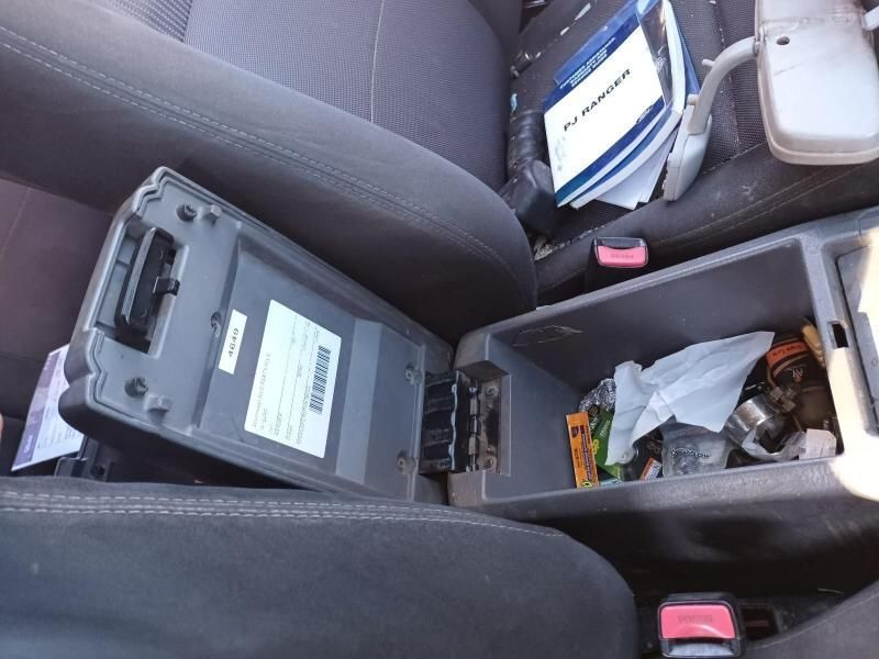 The Arm Rest of a Car Has a Sticker on It That Says Mitsubishi — South West 4WD Wreckers In Harristown, QLD