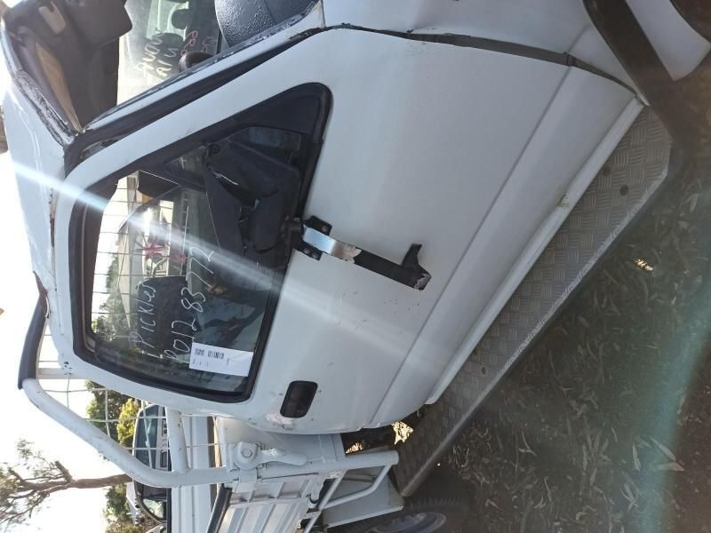 A White Truck With the Door Open and a Tag on It — South West 4WD Wreckers In Brisbane, QLD
