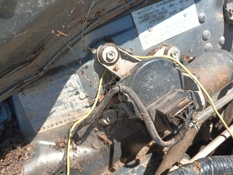 A Close Up of a Car Engine With a Yellow Wire Attached to It — South West 4WD Wreckers In Harristown, QLD