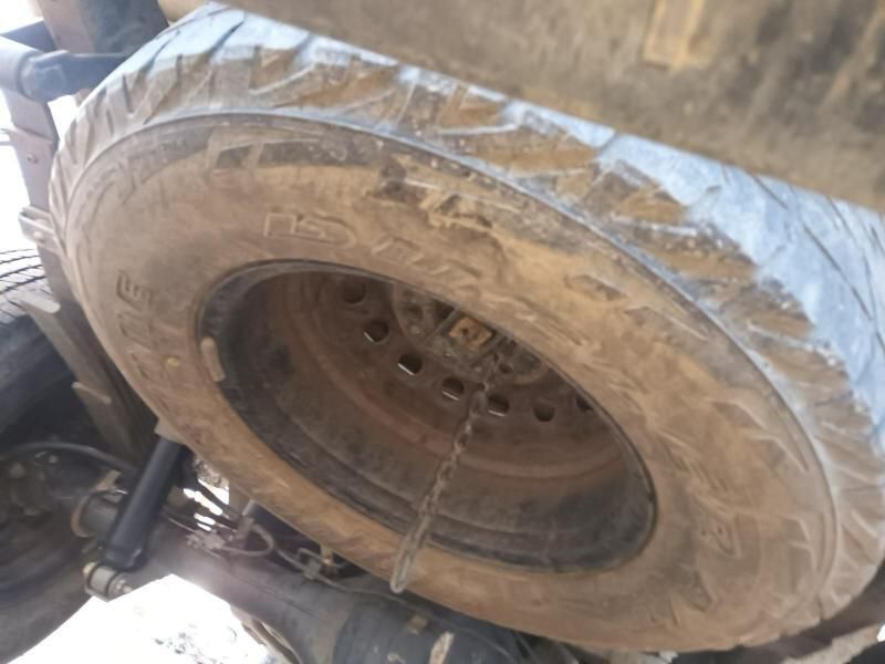 A Close Up of a Tire With a Chain Around It — South West 4WD Wreckers In Brisbane, QLD