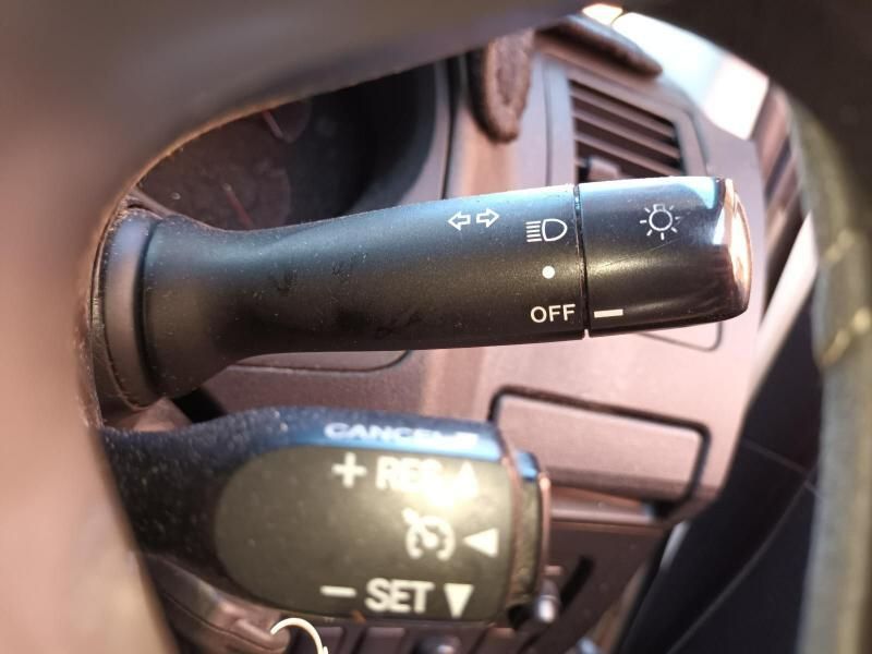 A Close Up of a Car Steering Wheel With a Cancel Button — South West 4WD Wreckers In Harristown, QLD