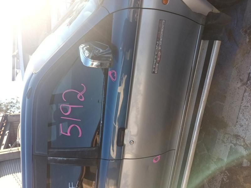 A Blue Car With the Number 592 Written on It — South West 4WD Wreckers In Brisbane, QLD