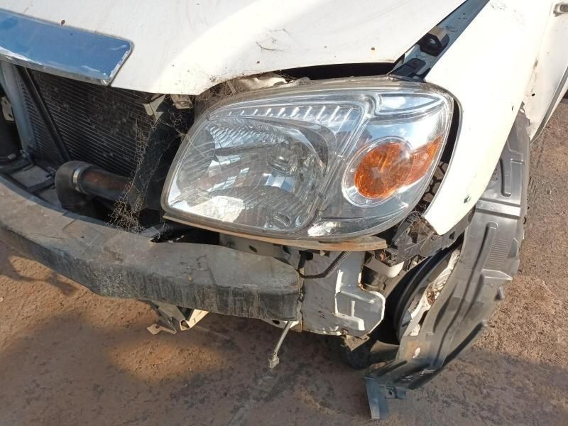 A White Car With a Broken Bumper and Headlight — South West 4WD Wreckers In Harristown, QLD