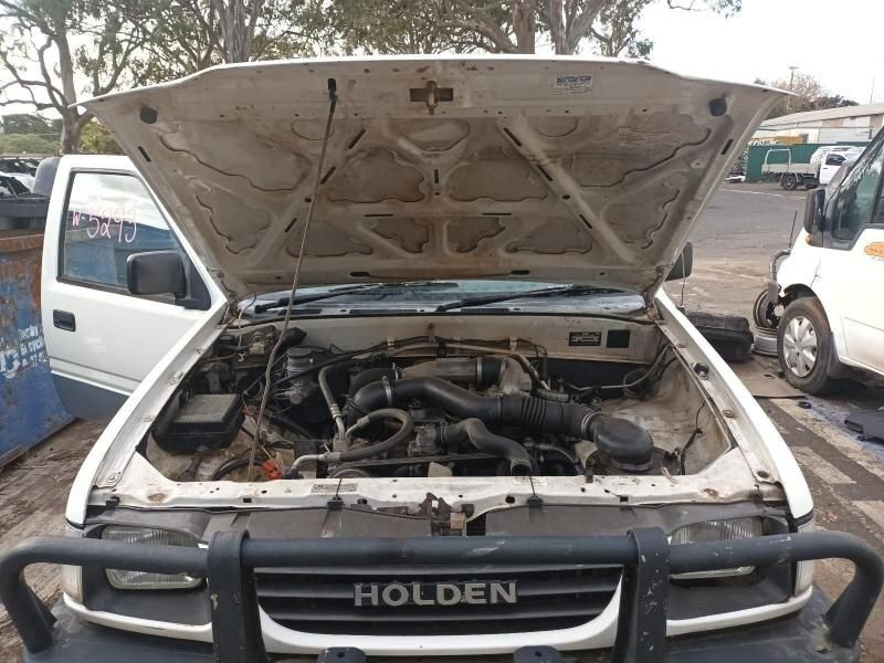A White Holden Truck With the Hood Open — South West 4WD Wreckers In Harristown, QLD