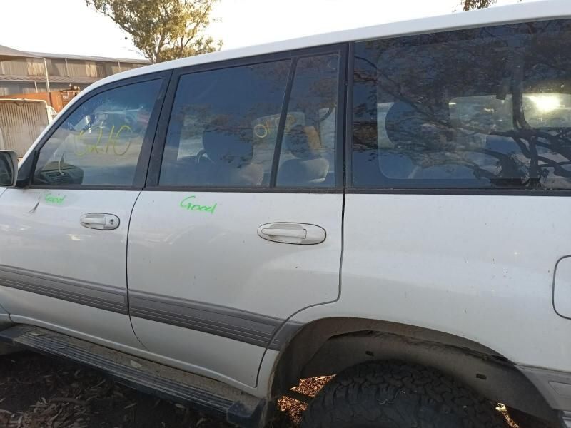 A White Suv With the Word Cargo on the Door — South West 4WD Wreckers In Harristown, QLD