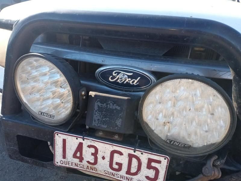 A Ford Truck With a License Plate That Says 143 Gd5 — South West 4WD Wreckers In Harristown, QLD