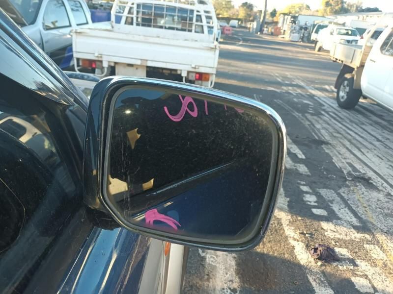 A Side View Mirror on a Car Has the Number 301 on It — South West 4WD Wreckers In Brisbane, QLD