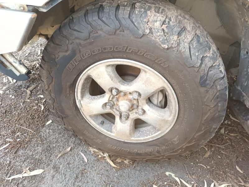 A Close Up of a Tire on a Car on the Ground — South West 4WD Wreckers In Harristown, QLD