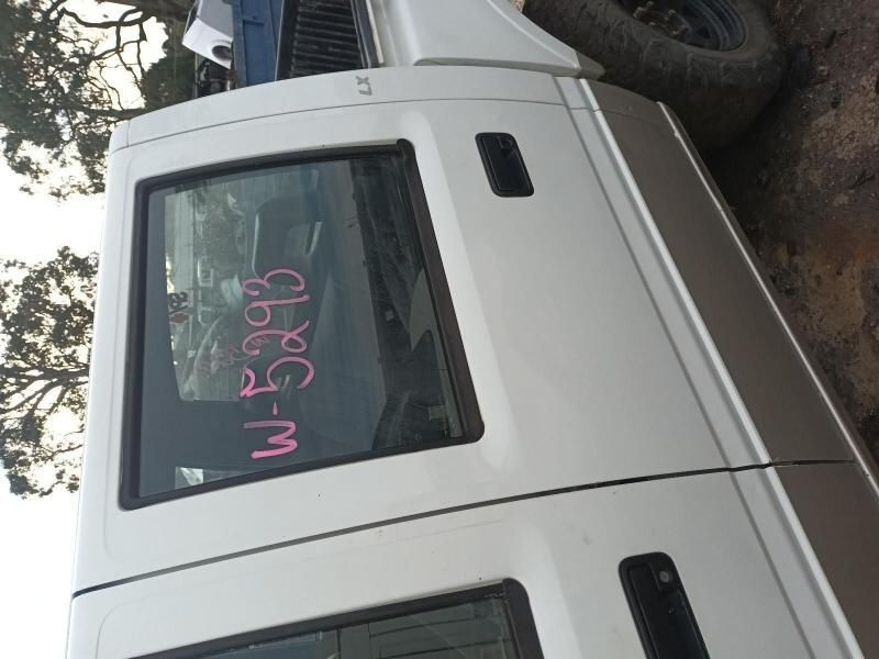 A White Van With the Word Wb on the Back Window — South West 4WD Wreckers In Harristown, QLD