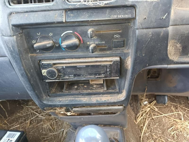 A Dirty Dashboard of a Car With a Radio in It — South West 4WD Wreckers In Brisbane, QLD