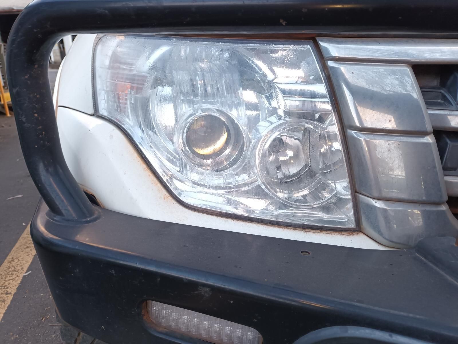 A Close Up of a Car 's Headlight on a Street — South West 4WD Wreckers In Brisbane, QLD