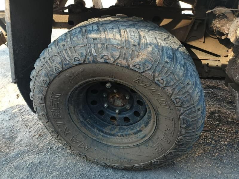 A Close Up of a Dirty Tire on a Vehicle — South West 4WD Wreckers In Harristown, QLD