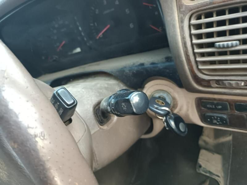 A Close Up of a Car Dashboard With the Keys in the Ignition — South West 4WD Wreckers In Harristown, QLD