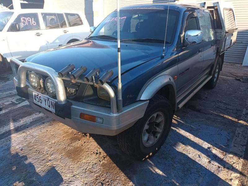 A Black Truck With a License Plate That Says E54 Yvon — South West 4WD Wreckers In Brisbane, QLD