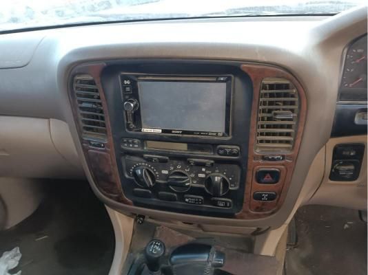 The Dashboard of a Car With a Radio and Climate Control — South West 4WD Wreckers In Harristown, QLD