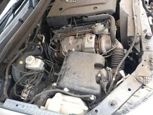 A Close Up of a Car Engine With the Hood Open — South West 4WD Wreckers In Brisbane, QLD