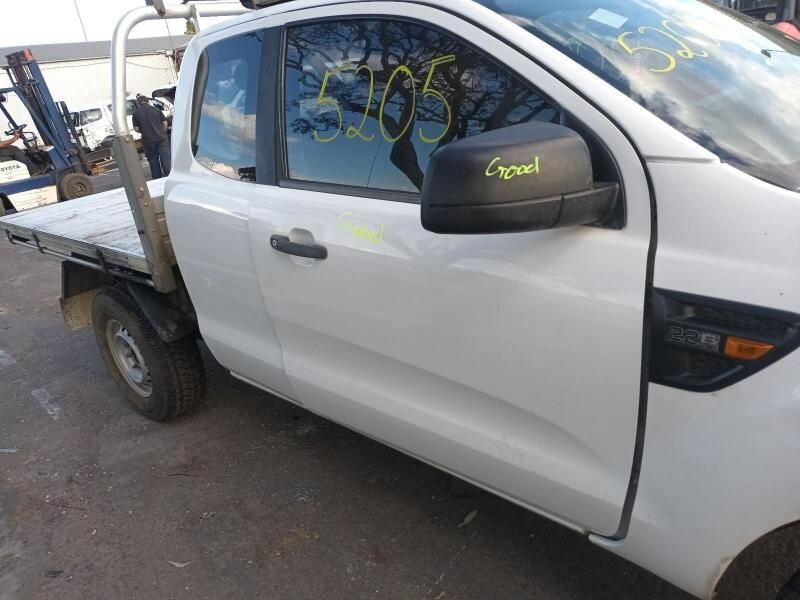 A White Truck is Parked on the Side of the Road — South West 4WD Wreckers In Brisbane, QLD