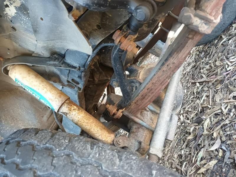 A Close Up of a Rusty Shock Absorber on a Truck — South West 4WD Wreckers In Brisbane, QLD