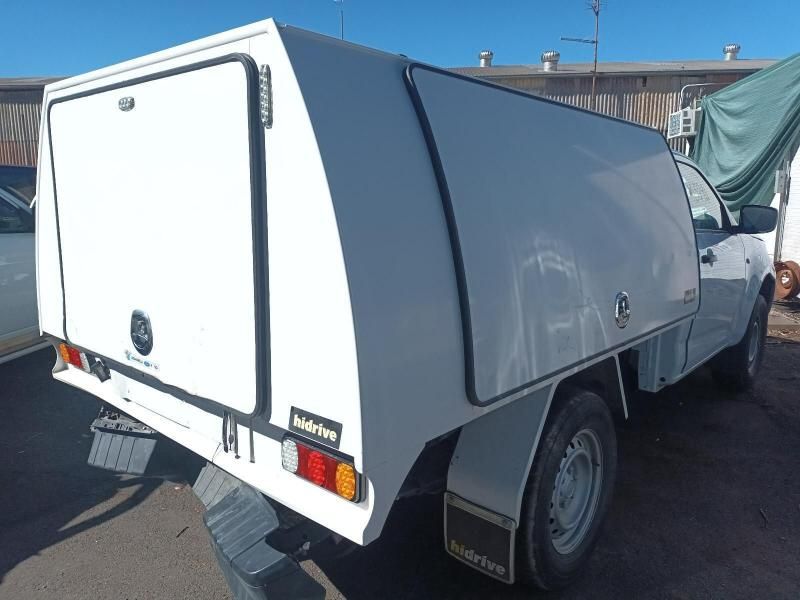 A White Truck With a Canopy on Top of It — South West 4WD Wreckers In Harristown, QLD