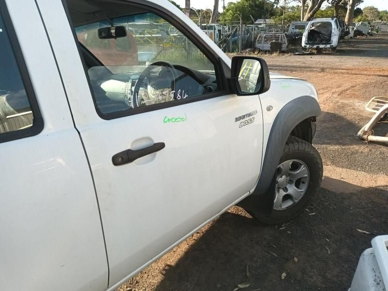 A White Truck With the Word Legend on the Door — South West 4WD Wreckers In Harristown, QLD