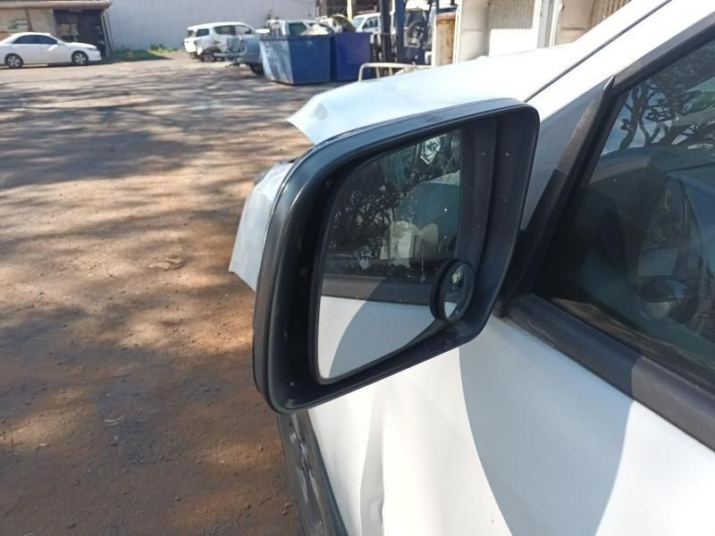A Close Up of a Side View Mirror on a White Car — South West 4WD Wreckers In Harristown, QLD
