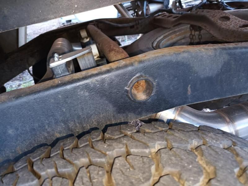 A Close Up of the Underside of a Vehicle With a Tire in the Foreground — South West 4WD Wreckers In Brisbane, QLD