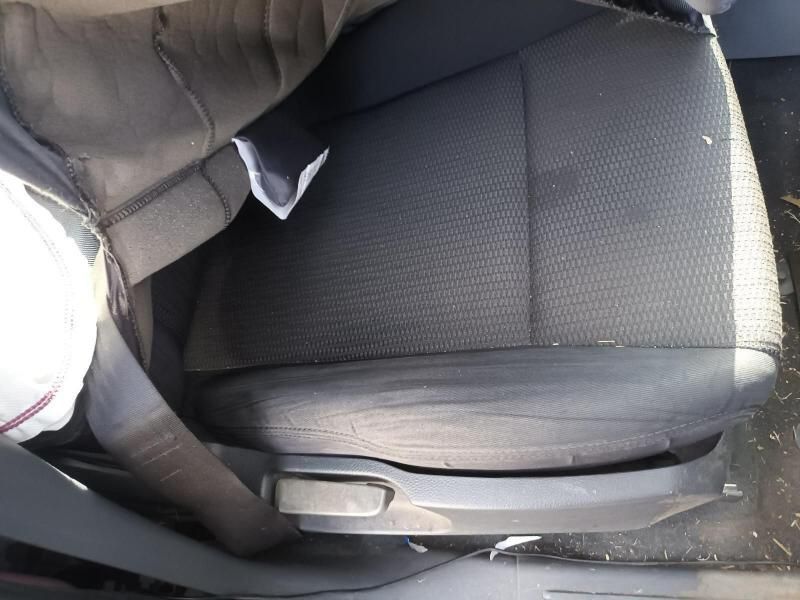 A Person is Sitting in the Back Seat of a Car — South West 4WD Wreckers In Harristown, QLD