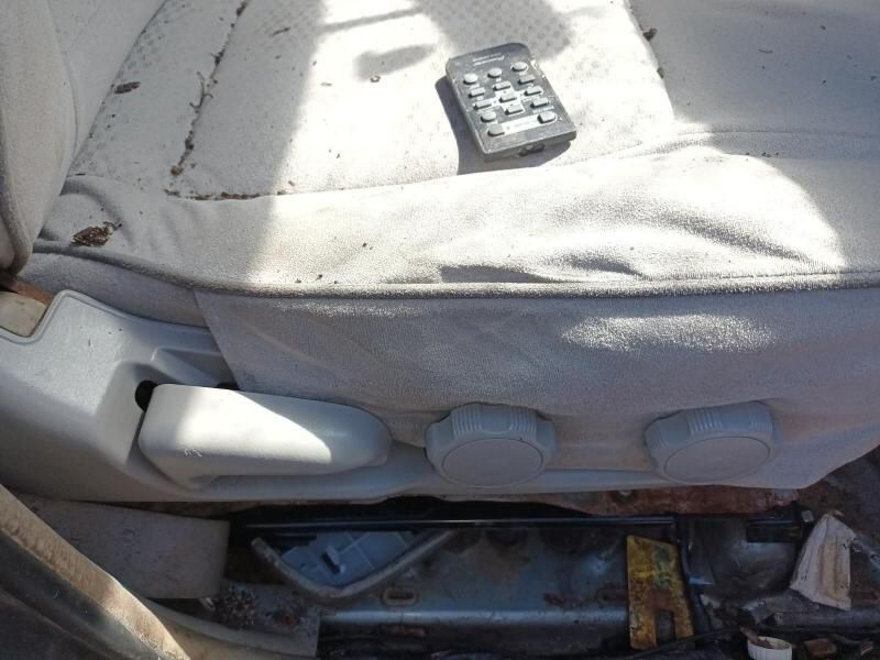 A Remote Control is Sitting on the Seat of a Car — South West 4WD Wreckers In Harristown, QLD
