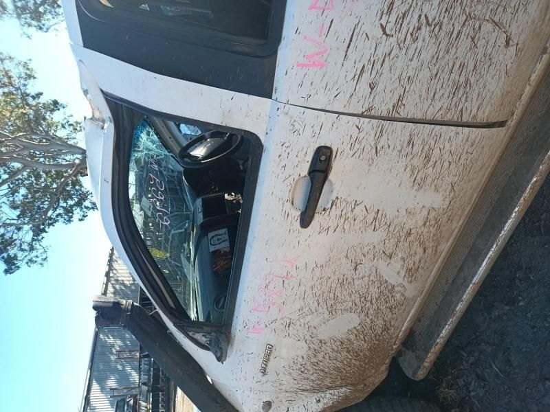 A White Car With a Broken Windshield is Parked on the Side of the Road — South West 4WD Wreckers In Harristown, QLD