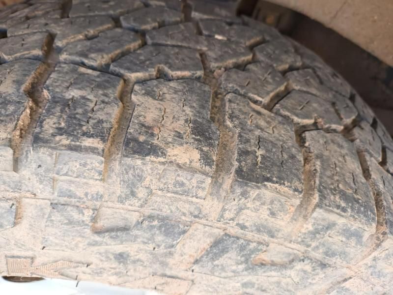 A Close Up of a Dirty Tire on a Car — South West 4WD Wreckers In Harristown, QLD