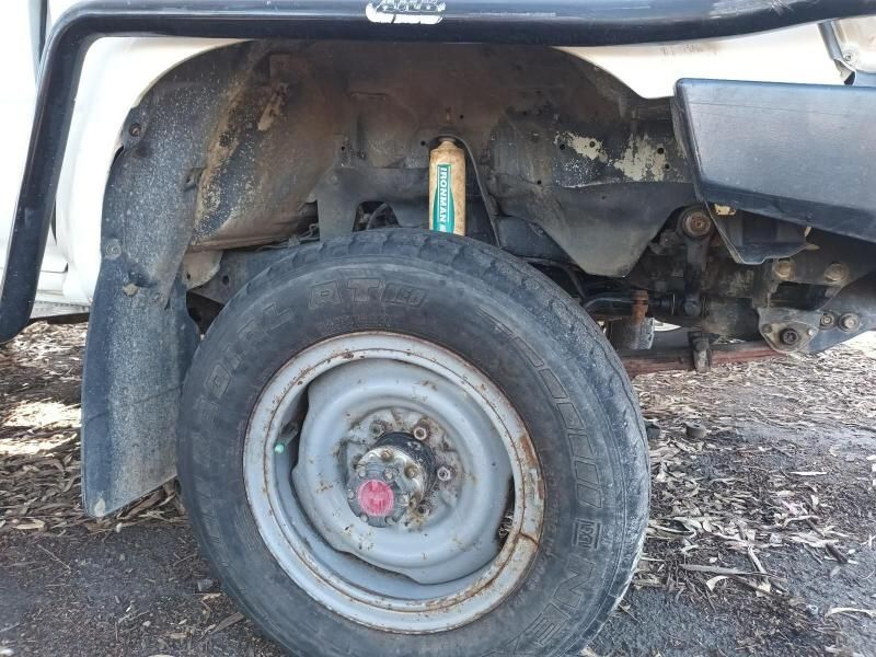 A Close Up of a Car Wheel With a Shock Absorber on It — South West 4WD Wreckers In Brisbane, QLD