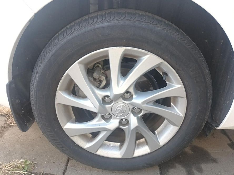 A Close Up of a Car Wheel with a Tire on It — South West 4WD Wreckers in Harristown, QLD